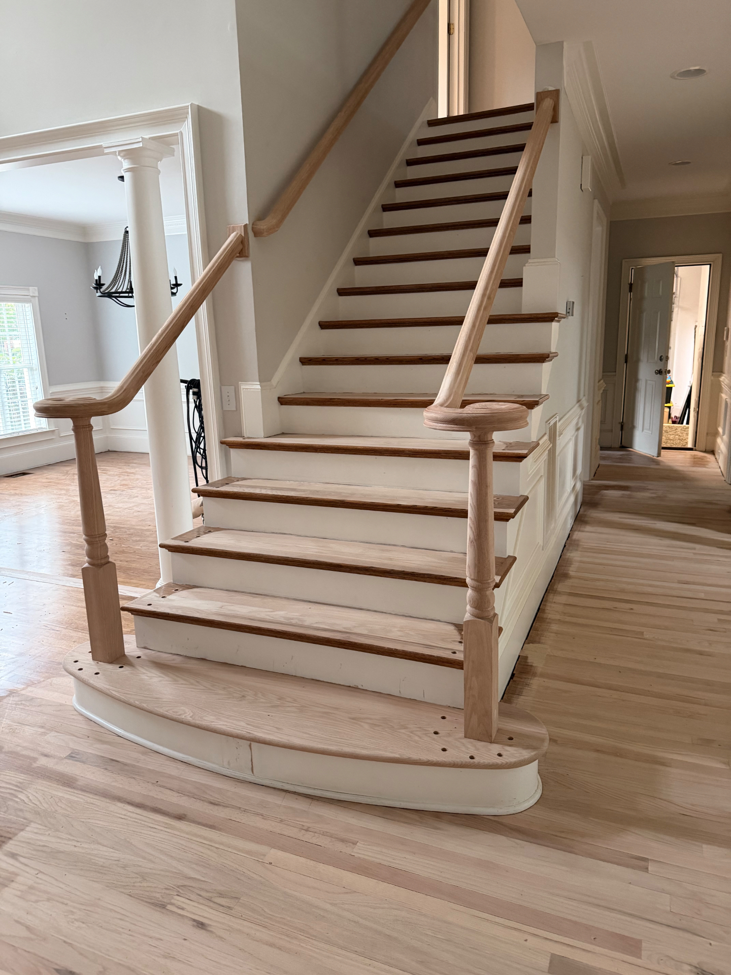 Red oak stair treads and sanded handrail installation